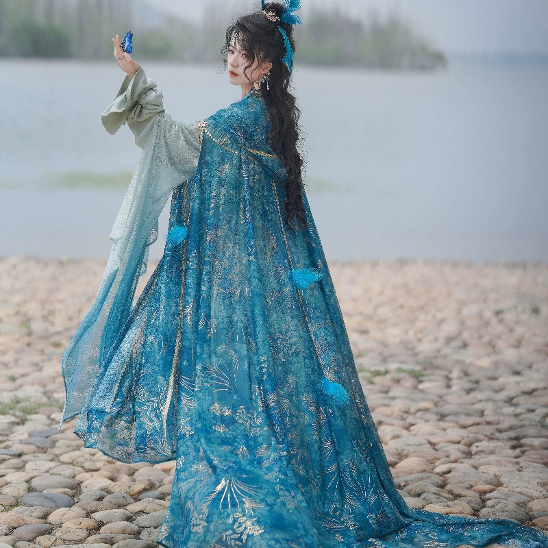 Blue traditional hanfu dress for women, inspired by the Song Dynasty style and crafted from luxurious silk. This hanfu includes a matching coat or jacket, making it perfect for winter and Chinese New Year celebrations. Ideal for occasions like graduations, cosplay events, or even as a fairy-style hanfu, this outfit combines elegance and historical charm. Available at our hanfu shop, where you can explore authentic hanfu for sale. A perfect choice for those wondering where to buy hanfu online, offering both 