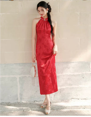 Close product view of the Dusk Red mulberry silk halter qipao dress, focused on its Chinese-inspired design details.
