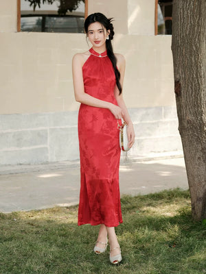 Dusk Red mulberry silk halter qipao dress styled to show its fit and drape, including mulberry silk, halter neckline and refined red cheongsam silhouette.