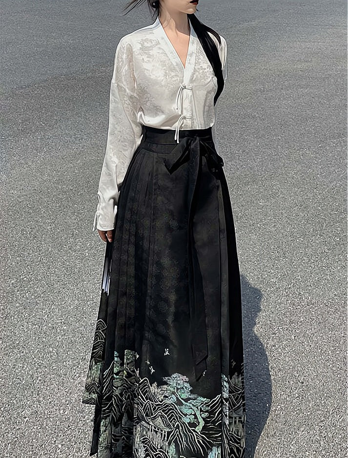 Explore modern elegance with our Black & White Shirt Women's Horse Face Skirt Suit. This ensemble blends traditional Hanfu design with contemporary flair, featuring intricate embroidery and authentic details. Embrace the timeless beauty of Hanfu fashion and make a statement with your unique style.