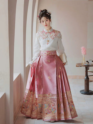 Front view of the pink four-piece Hanfu outfit showing the decorative waist belt and pleated skirt