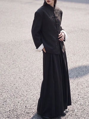 Full-length styling view of the black bamboo blazer