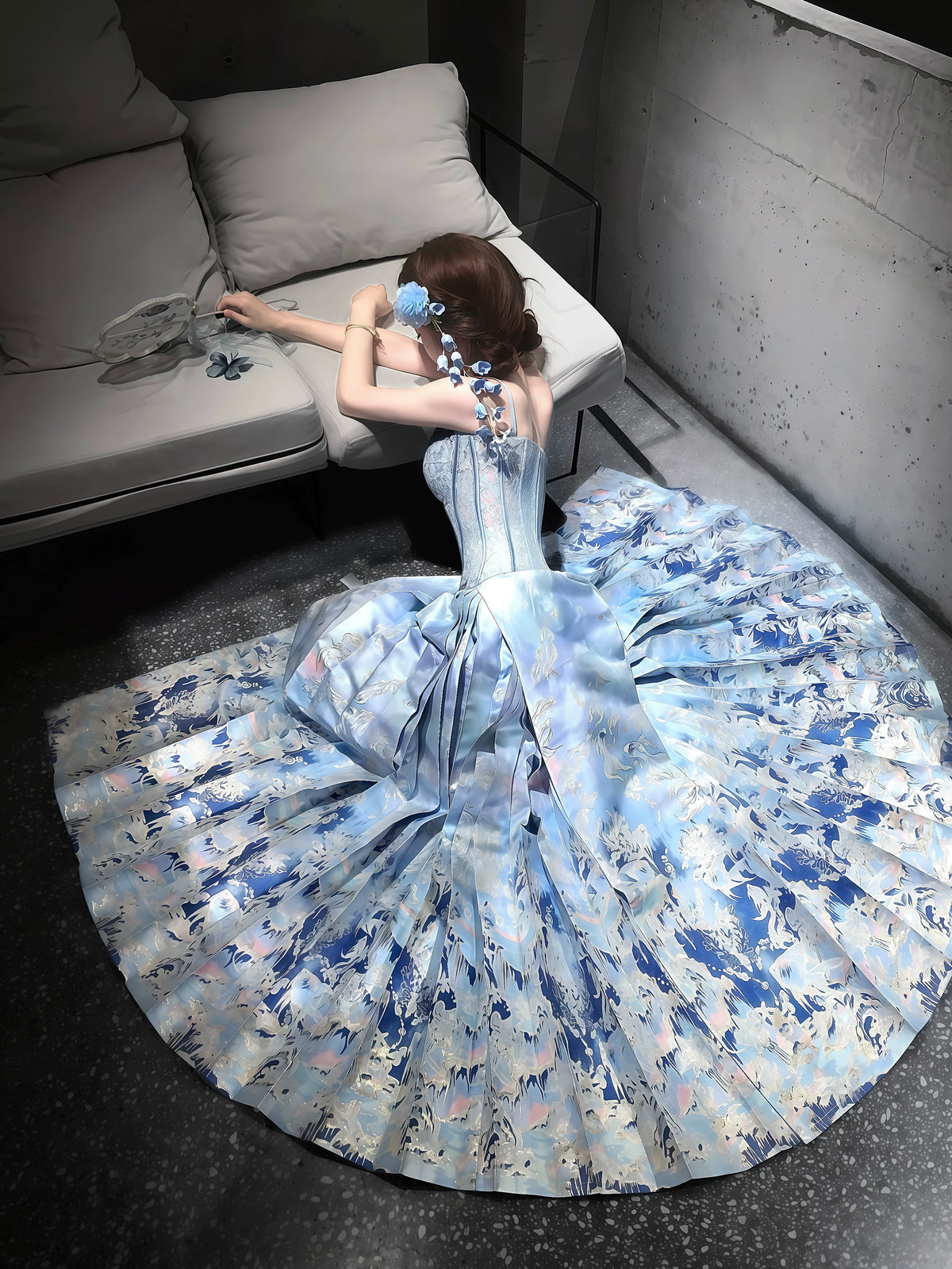 Gold-toned fish motifs on a pleated blue wrap skirt