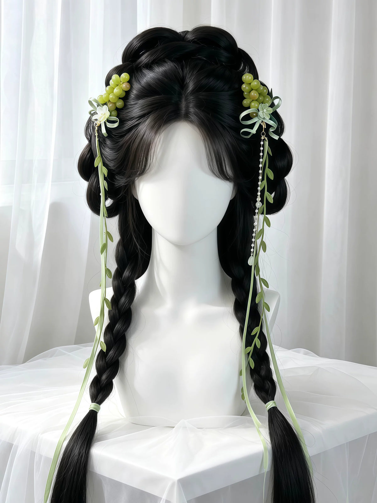 Side view of grape-inspired hair clips and long ribbons