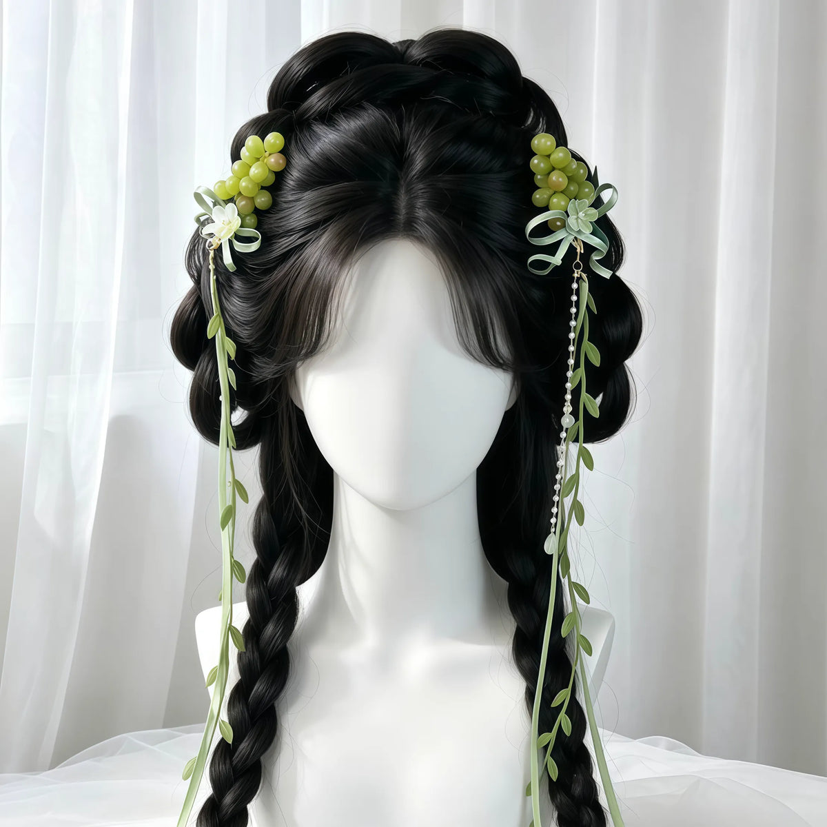 Close view of green grape ornaments styled with braids