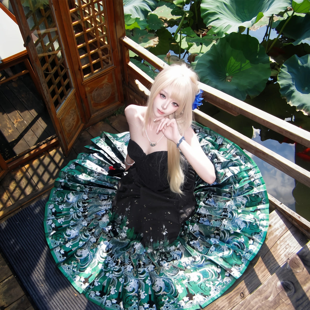 Green brocade skirt showing the drape of its pleats