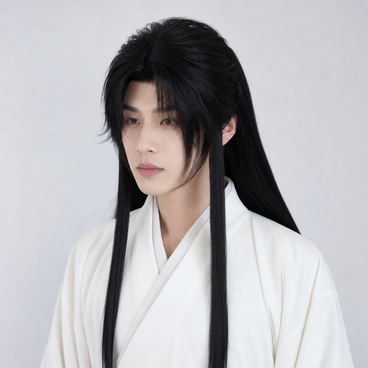 Chinese male model wearing black ancient Hanfu cosplay wig with hand-crocheted hairline side bangs and long side strands