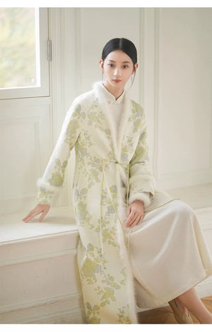 Occasion styling image of the Ivory-Green woven floral wool-blend long coat, presented as an elegant New Chinese Style coat.