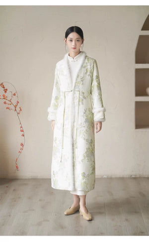 Front styling view of the Ivory-Green woven floral wool-blend long coat, with woven floral pattern, wool-blend texture and elegant long-line shape.