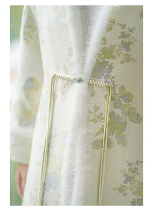 Ivory-Green woven floral wool-blend long coat styled to show its fit and drape, including woven floral pattern, wool-blend texture and elegant long-line shape.