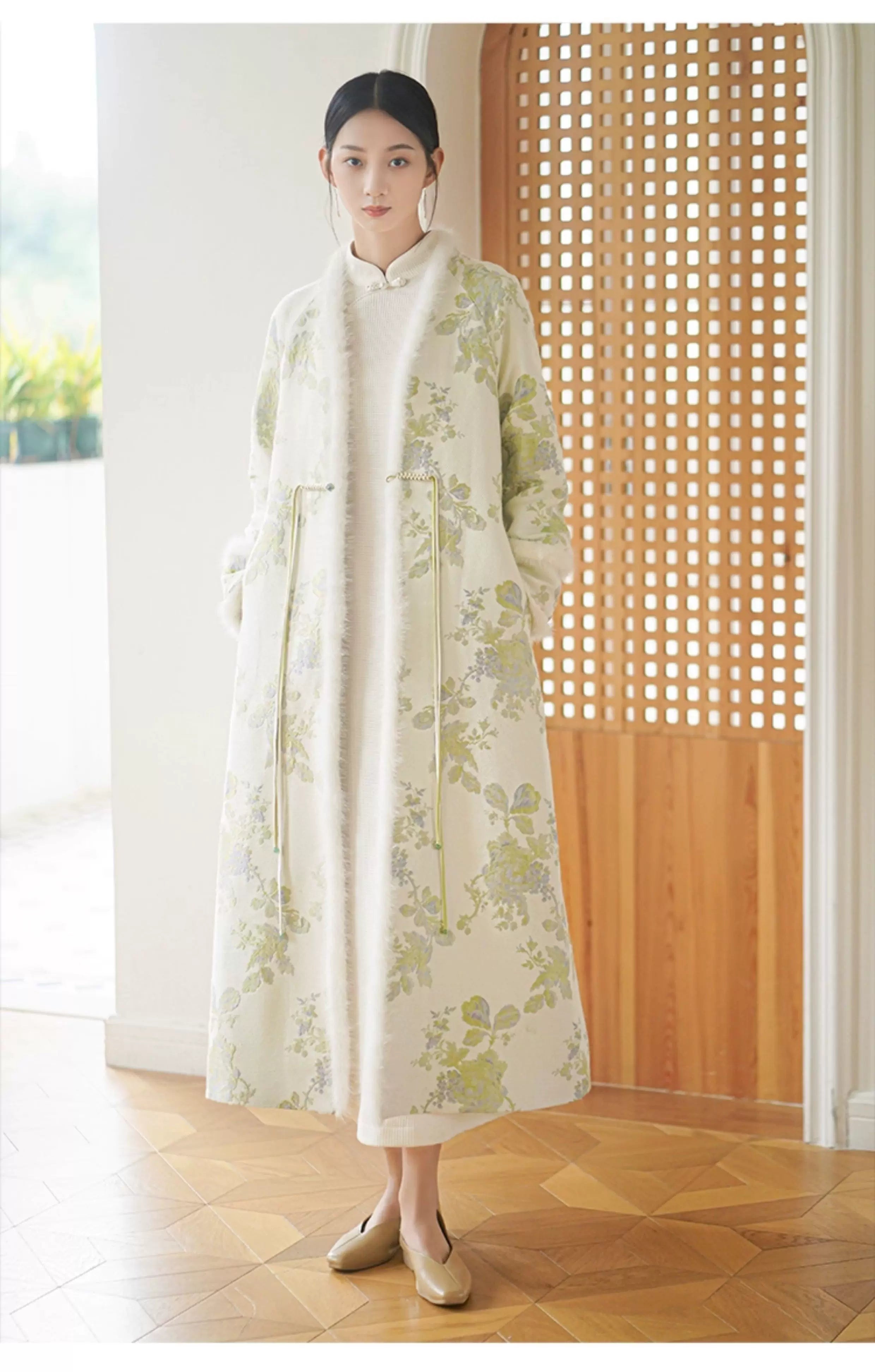 Silhouette and fit view of the Ivory-Green woven floral wool-blend long coat, a contemporary New Chinese Style coat.