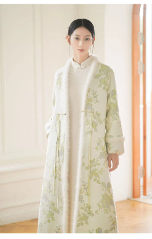 Occasion styling image of the Ivory-Green woven floral wool-blend long coat, presented as an elegant New Chinese Style coat.