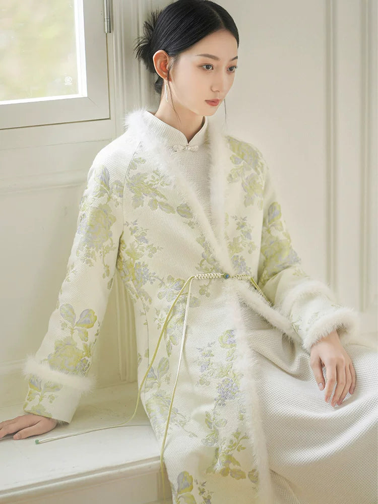 Front styling view of the Ivory-Green woven floral wool-blend long coat, with woven floral pattern, wool-blend texture and elegant long-line shape.