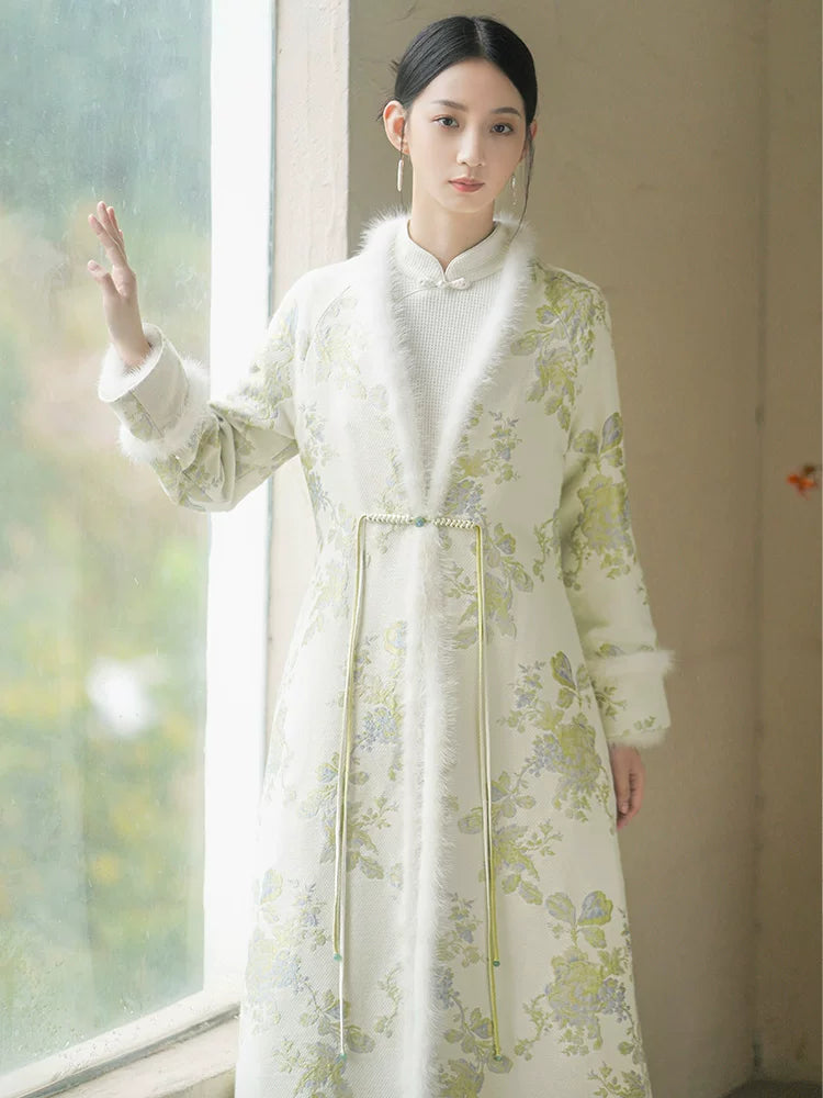 Three-quarter product view of the Ivory-Green woven floral wool-blend long coat, a refined New Chinese Style coat for elegant occasions.