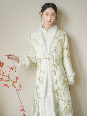 Ivory-Green woven floral wool-blend long coat styled to show its fit and drape, including woven floral pattern, wool-blend texture and elegant long-line shape.