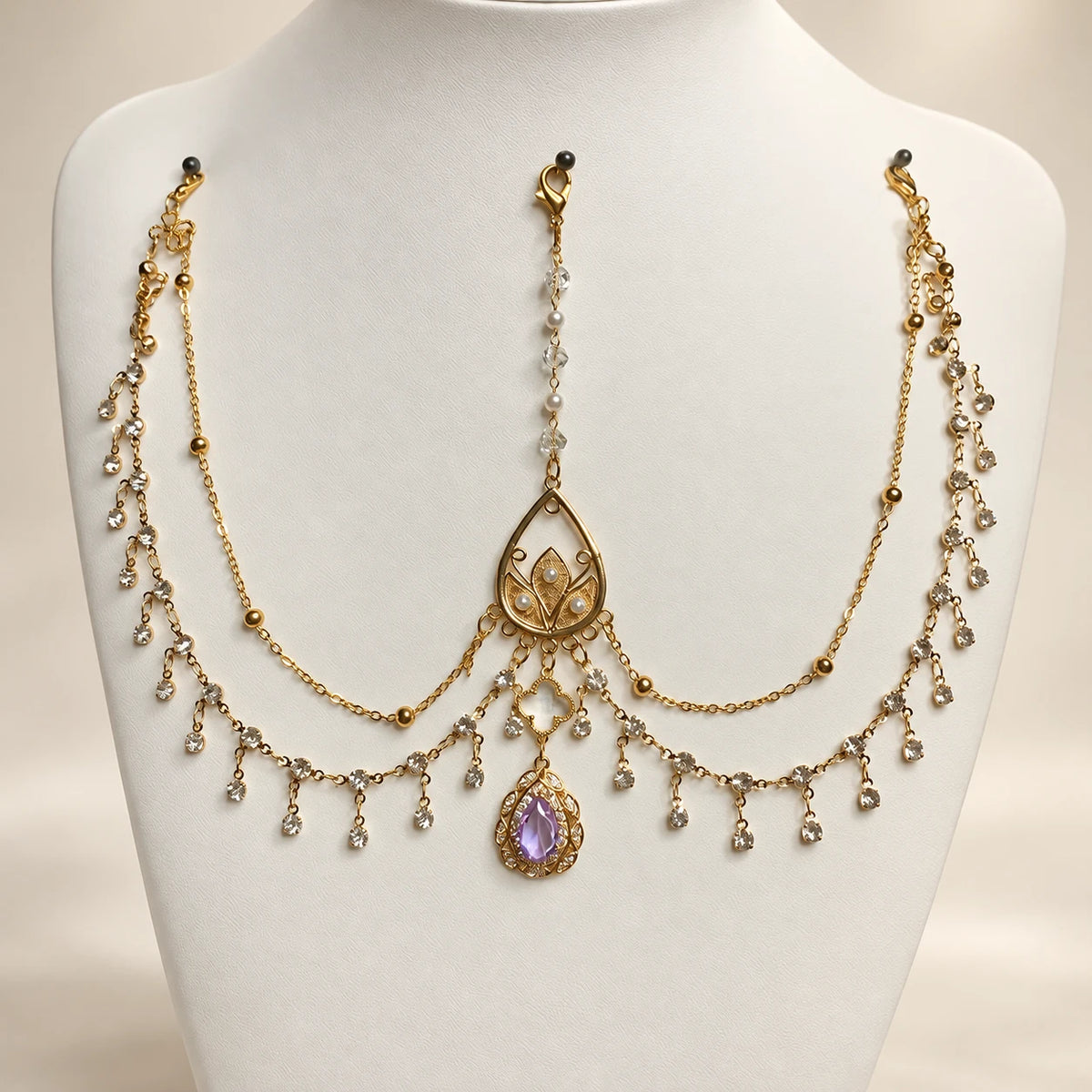 Purple forehead chain on a display bust