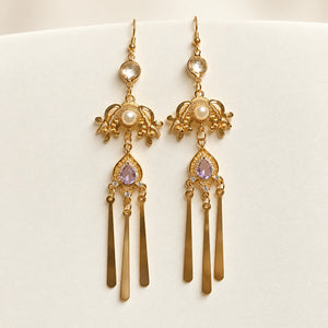 Long matching earrings with purple accents