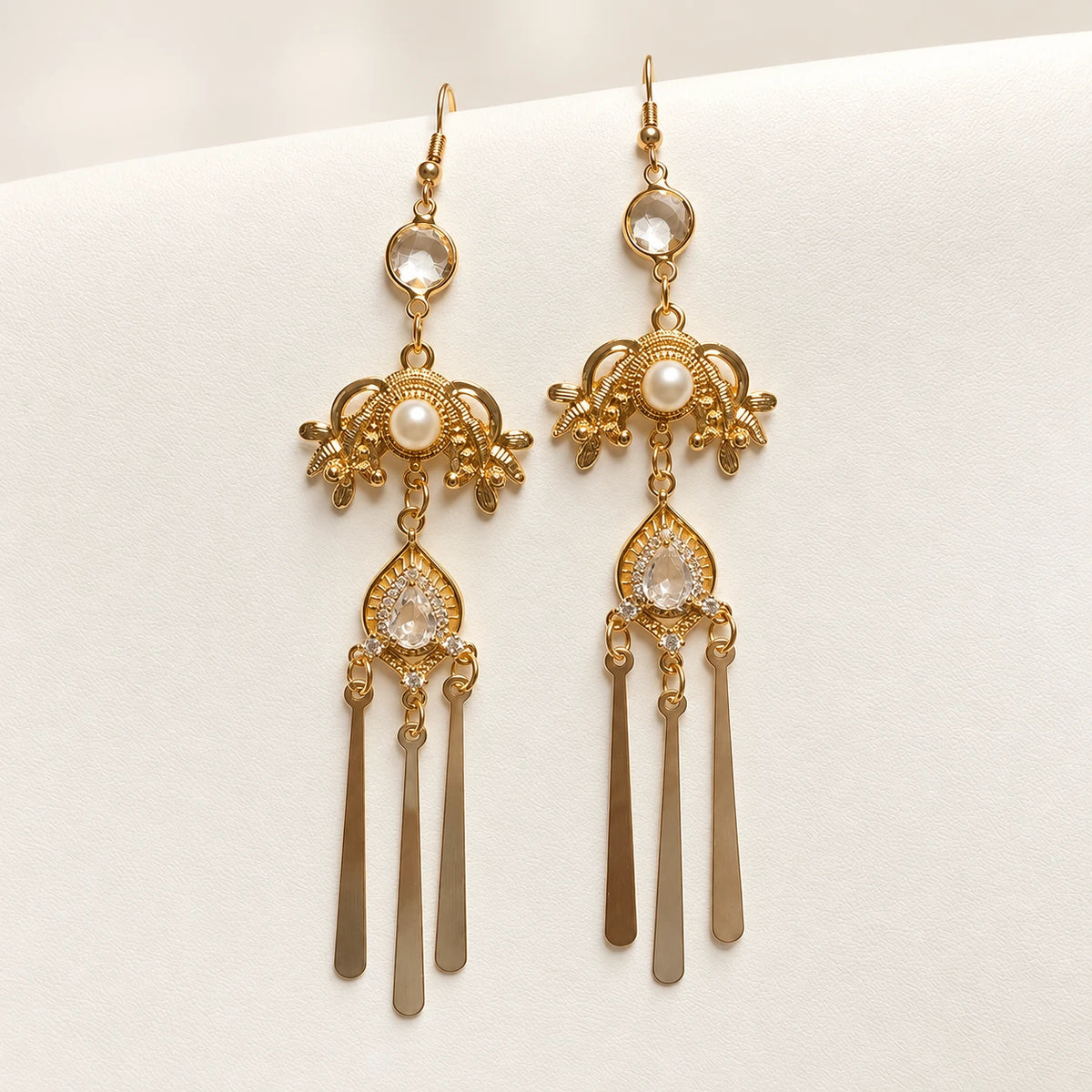 Long matching earrings with clear accents