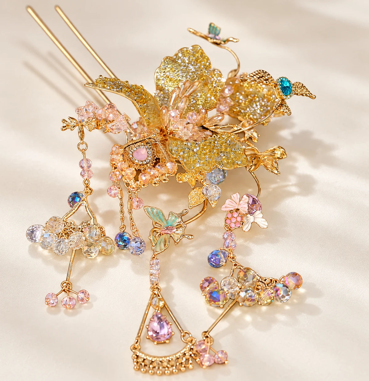 Gold-tone floral hairpin with bead and tassel details