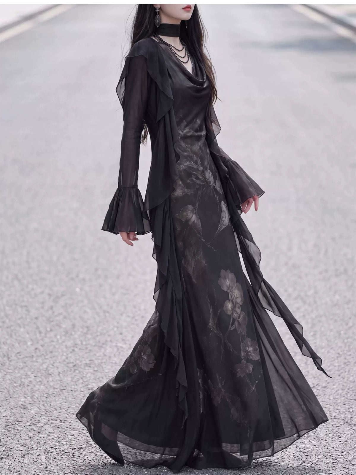 Long black ruffle cardigan sleeve and hem movement