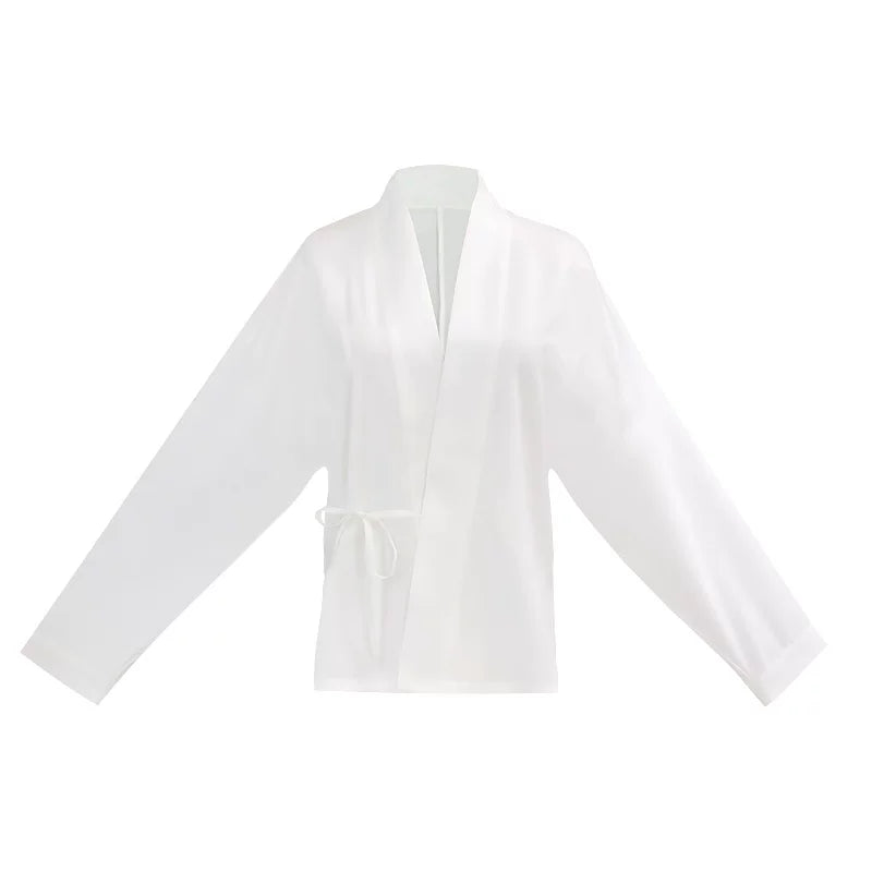 White cross-collar Hanfu blouse with wide sleeves and a side waist tie