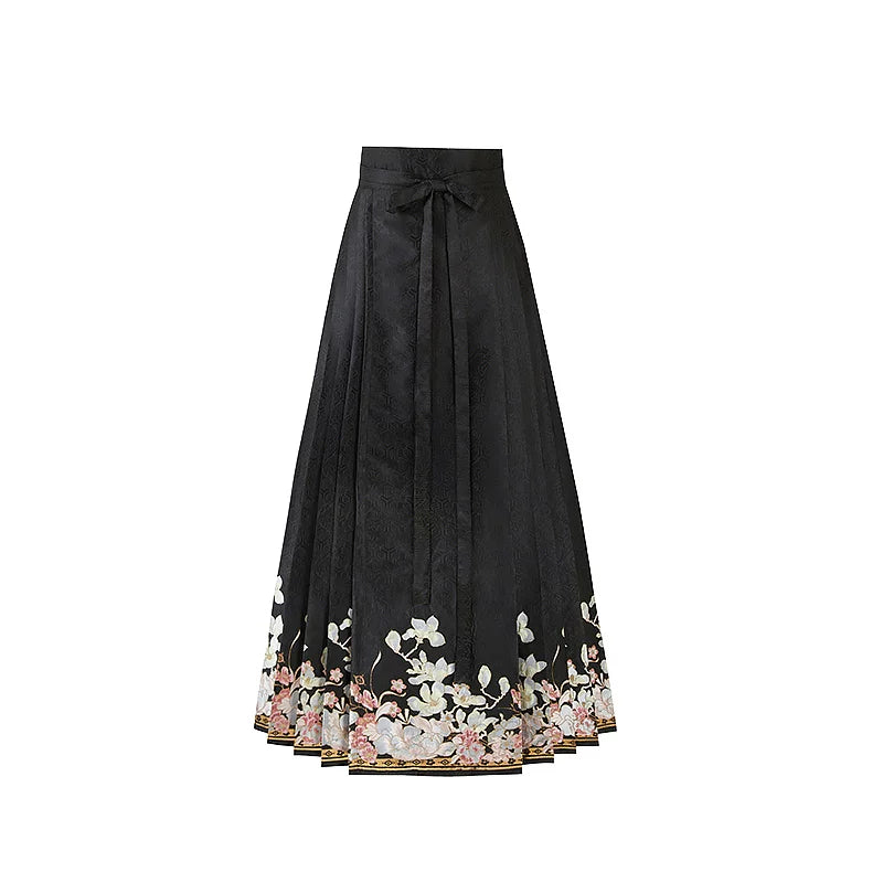 Black magnolia mamian skirt with a cream and pale pink floral border