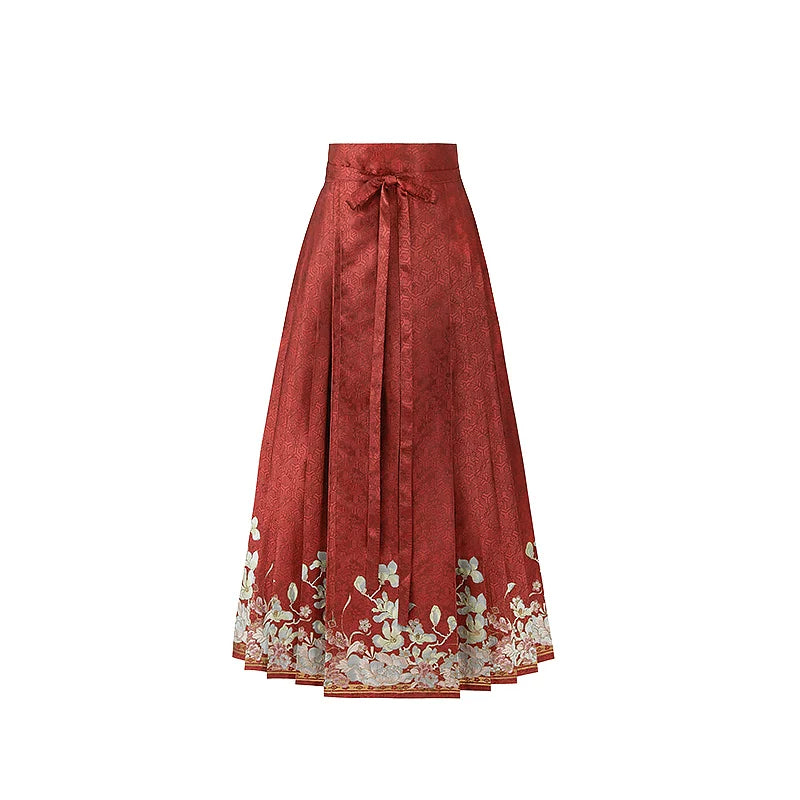 Red magnolia mamian skirt with a cream floral border and tie waistband