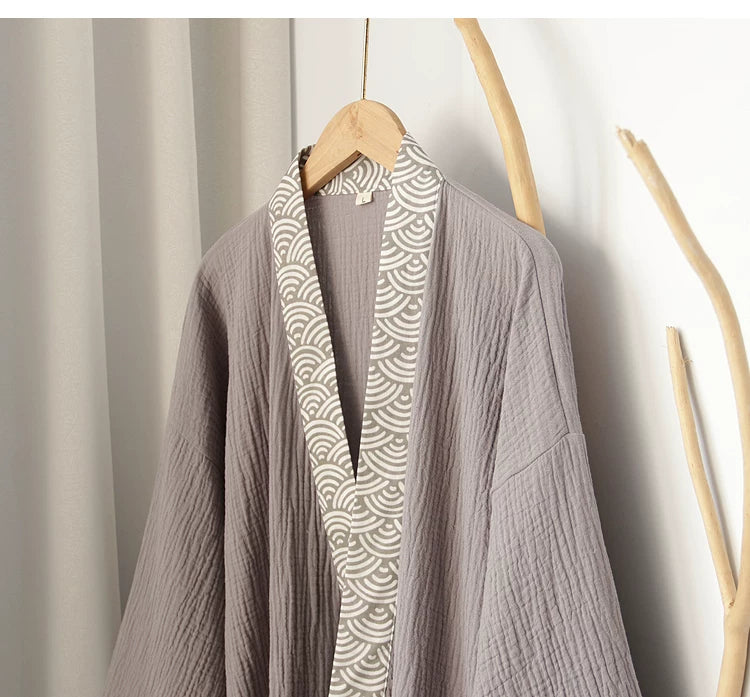 Wide sleeve and wave-trim cuff detail on the gray loungewear top
