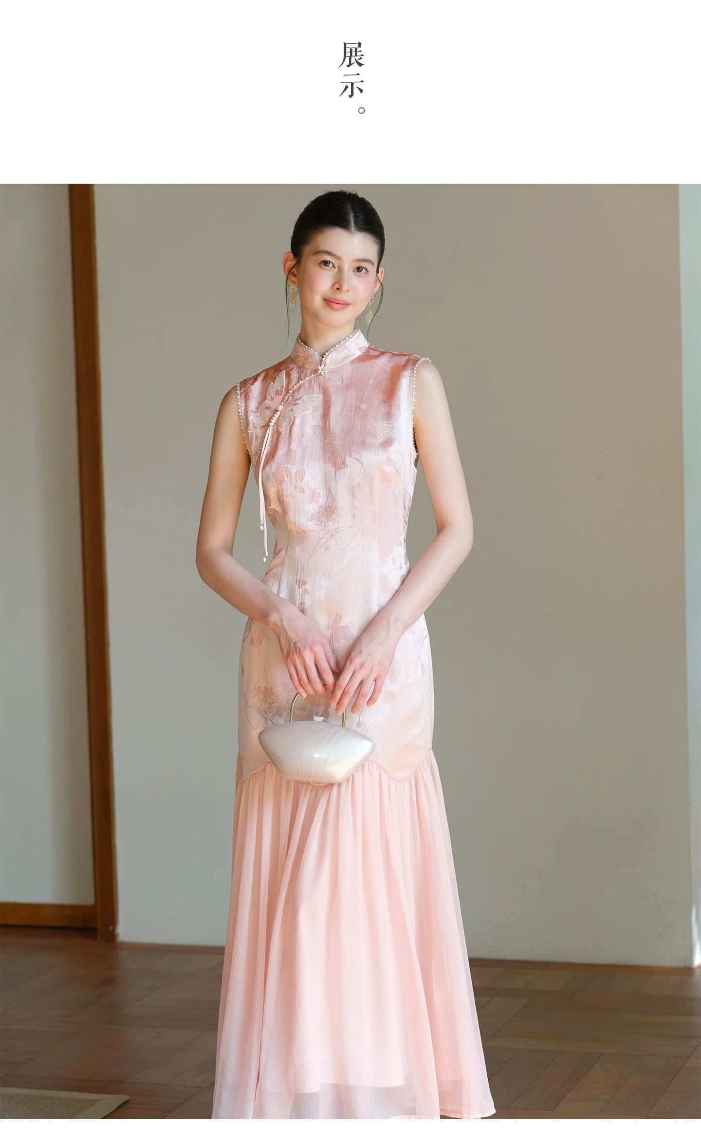 Design view of the Misty Blush floral jacquard cheongsam dress, highlighting floral jacquard texture, fitted waist and elegant long silhouette.