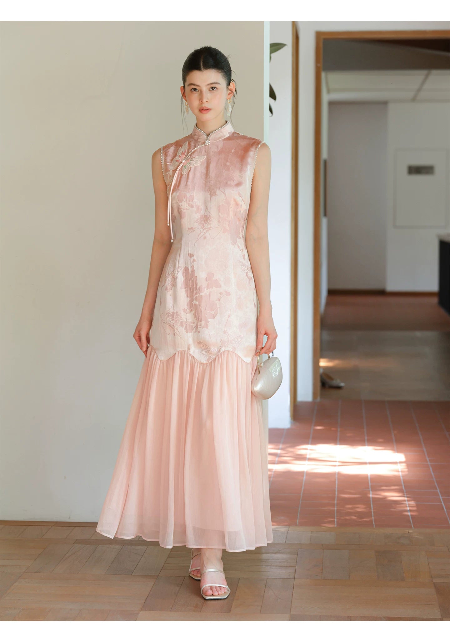Close product view of the Misty Blush floral jacquard cheongsam dress, focused on its Chinese-inspired design details.