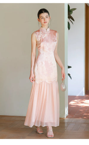 Misty Blush floral jacquard cheongsam dress styled to show its fit and drape, including floral jacquard texture, fitted waist and elegant long silhouette.