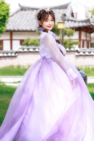 Modern purple princess hanbok for women – flowy traditional Korean palace dress with draped sleeves, ideal for performances, cosplay, events, and photoshoots