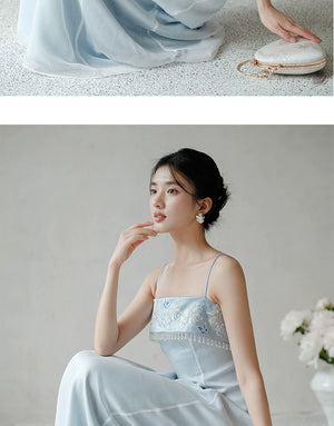Detailed product image of the Moonlight Blue embroidered A-line slip dress, showing fabric texture, finish and craftsmanship.