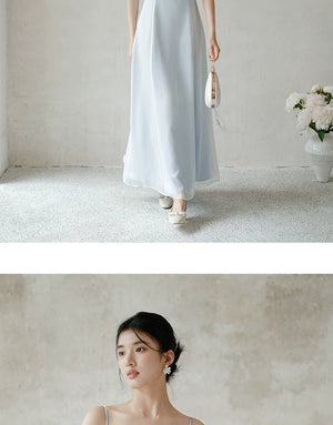 Close product view of the Moonlight Blue embroidered A-line slip dress, focused on its Chinese-inspired design details.