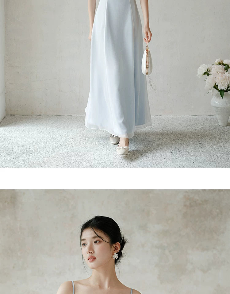 Close product view of the Moonlight Blue embroidered A-line slip dress, focused on its Chinese-inspired design details.