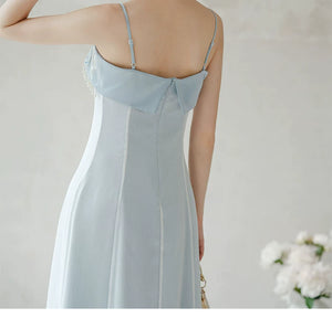 Silhouette and fit view of the Moonlight Blue embroidered A-line slip dress, a contemporary modern Chinese dress.