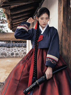 Front view of navy Hanbok jacket with floral cuffs and burgundy skirt