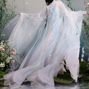 Pale blue chest-high skirt and flowing hem