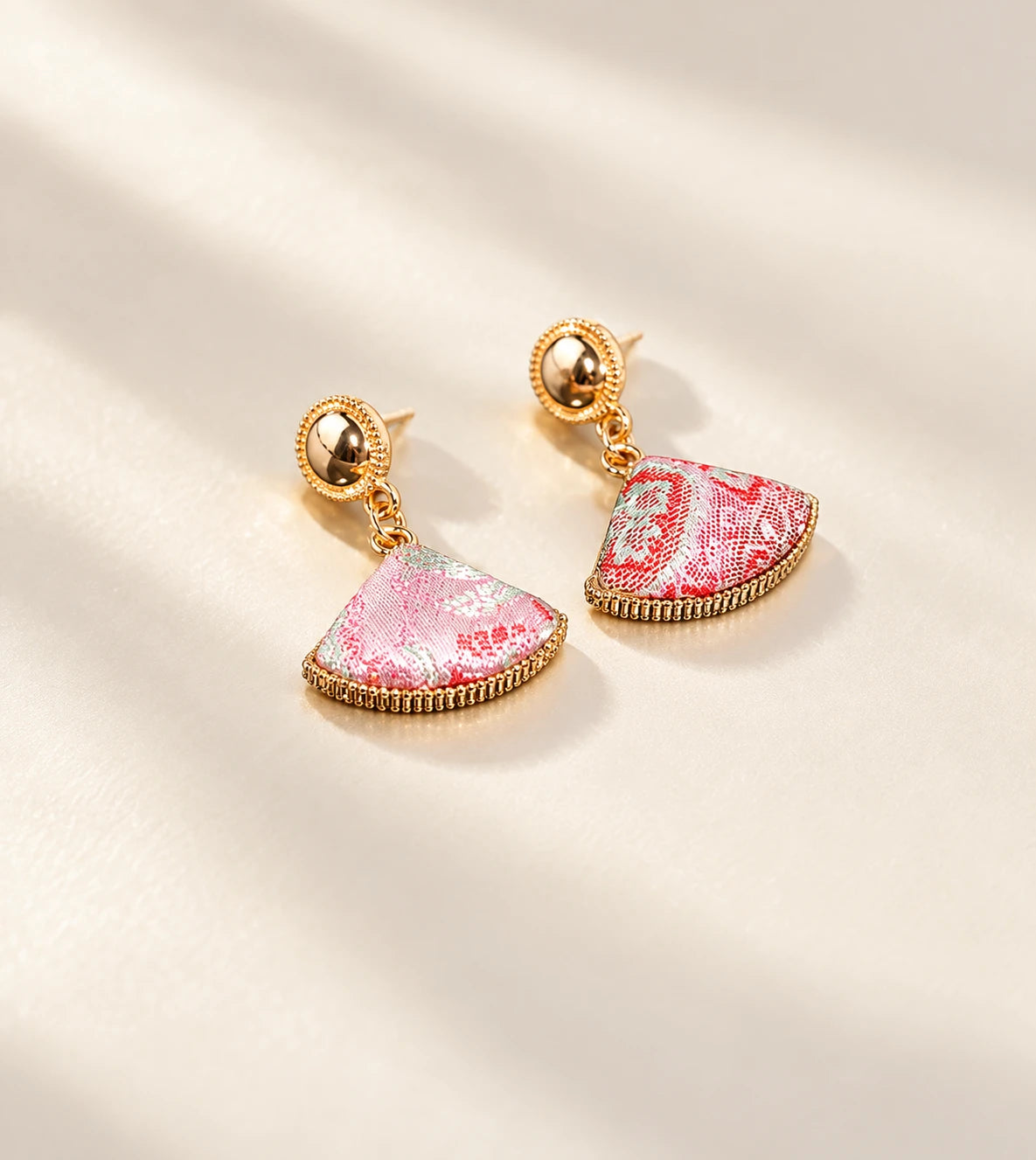 Peach Blossom pink fan-shaped earrings pair