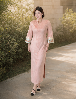 Peach Oolong floral plus size qipao dress in soft outdoor daylight, full front view