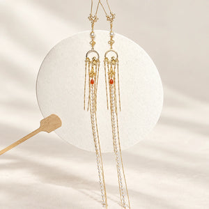 Extra-long tassel hairpins displayed as a pair