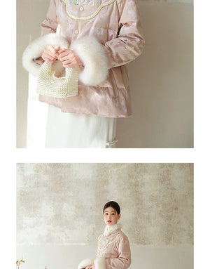 Detailed product image of the Pink-Lilac jacquard down jacket with fur trim, showing fabric texture, finish and craftsmanship.
