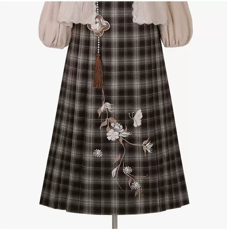 Brown plaid skirt with floral embroidery and the decorative hanging waist ornament
