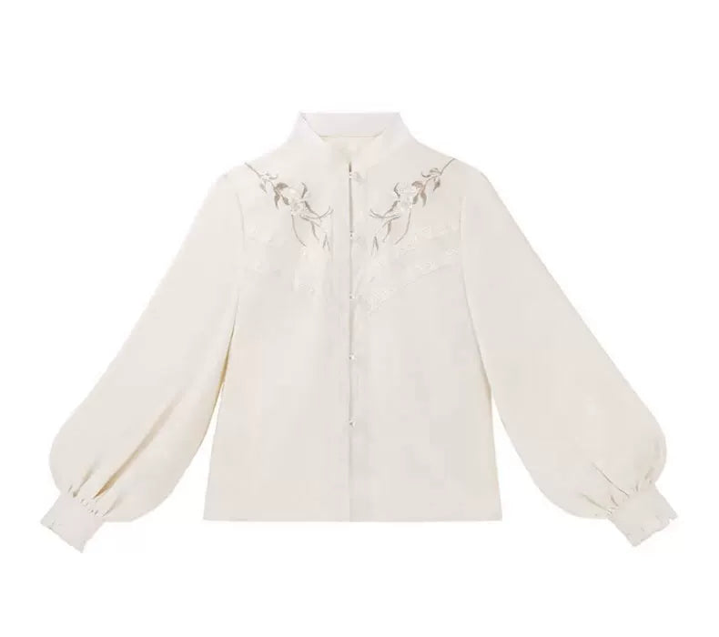 Ivory standing-collar blouse with floral embroidery and gathered long sleeves