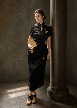 Plus size black butterfly jacquard cheongsam, full view on Western model