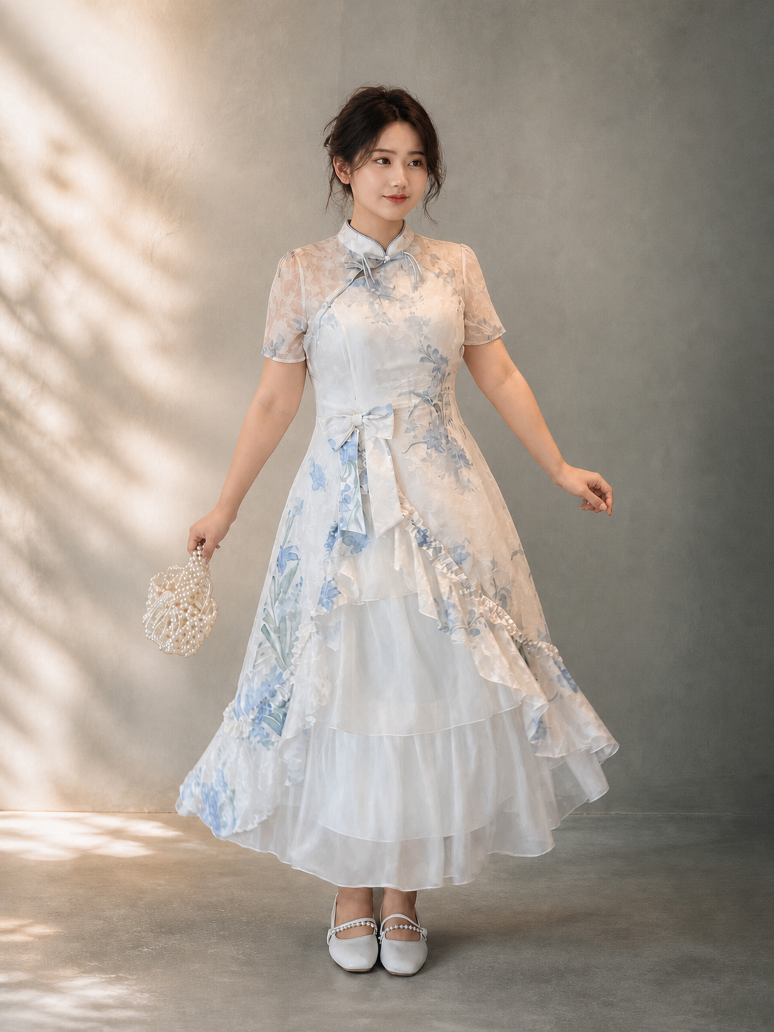 Plus size faux two-piece Chinese dress in blue, full front editorial view