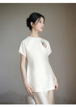 Occasion styling image of the Porcelain-Moon mulberry silk top and champagne skirt, presented as an elegant New Chinese Style silk outfit.