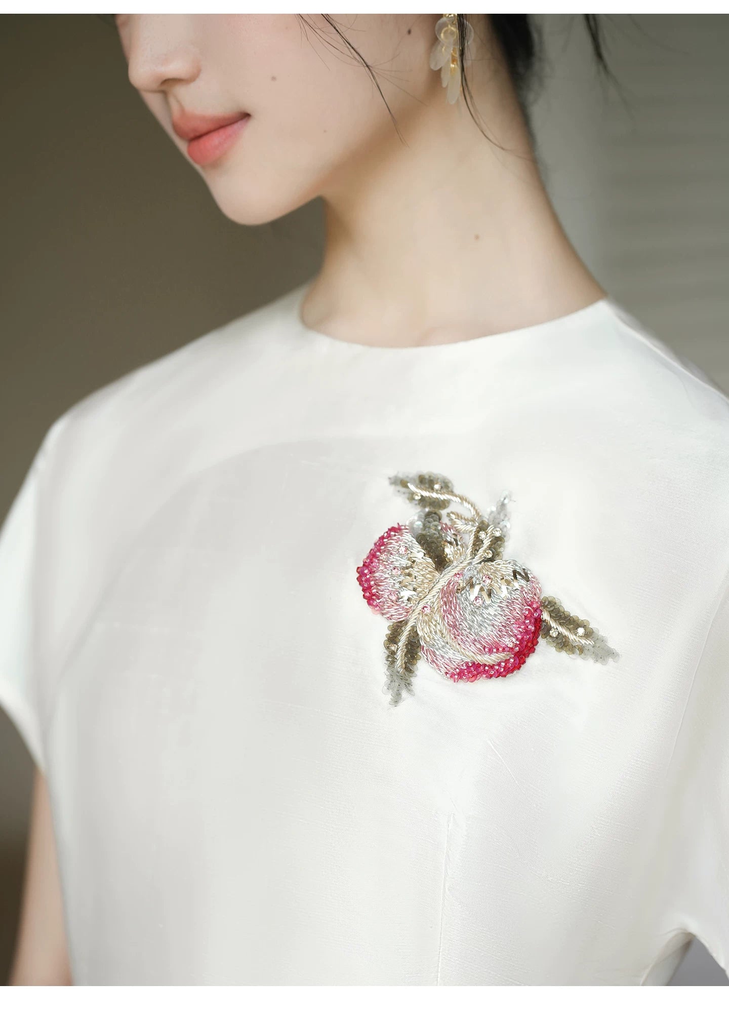 Three-quarter product view of the Porcelain-Moon mulberry silk top and champagne skirt, a refined New Chinese Style silk outfit for elegant occasions.