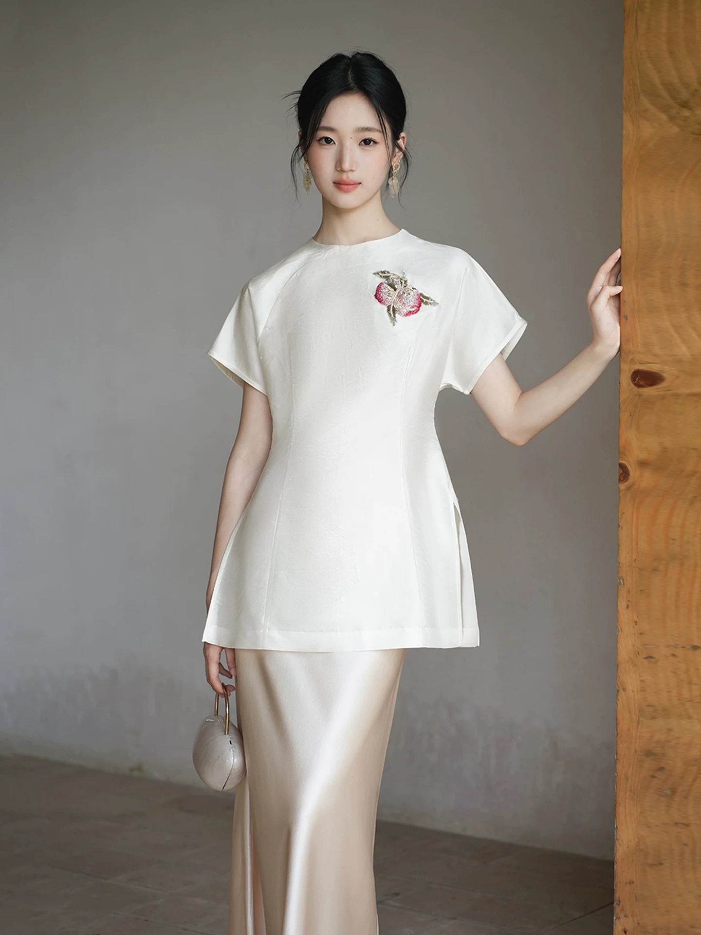 Front styling view of the Porcelain-Moon mulberry silk top and champagne skirt, with mulberry silk top, champagne skirt and refined Chinese-inspired styling.