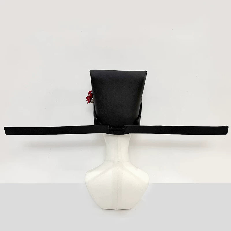 Rear view of a long-wing black futou hat